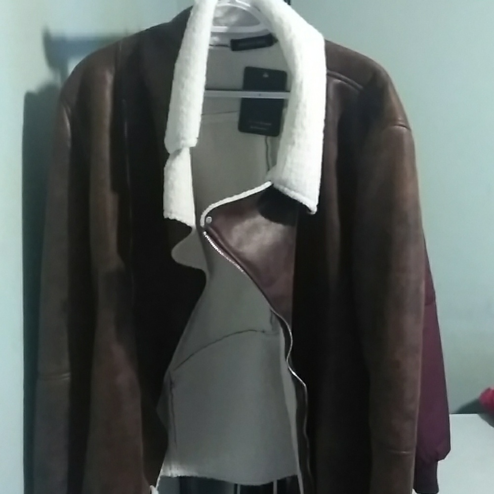 Brown leather jacket w/fur